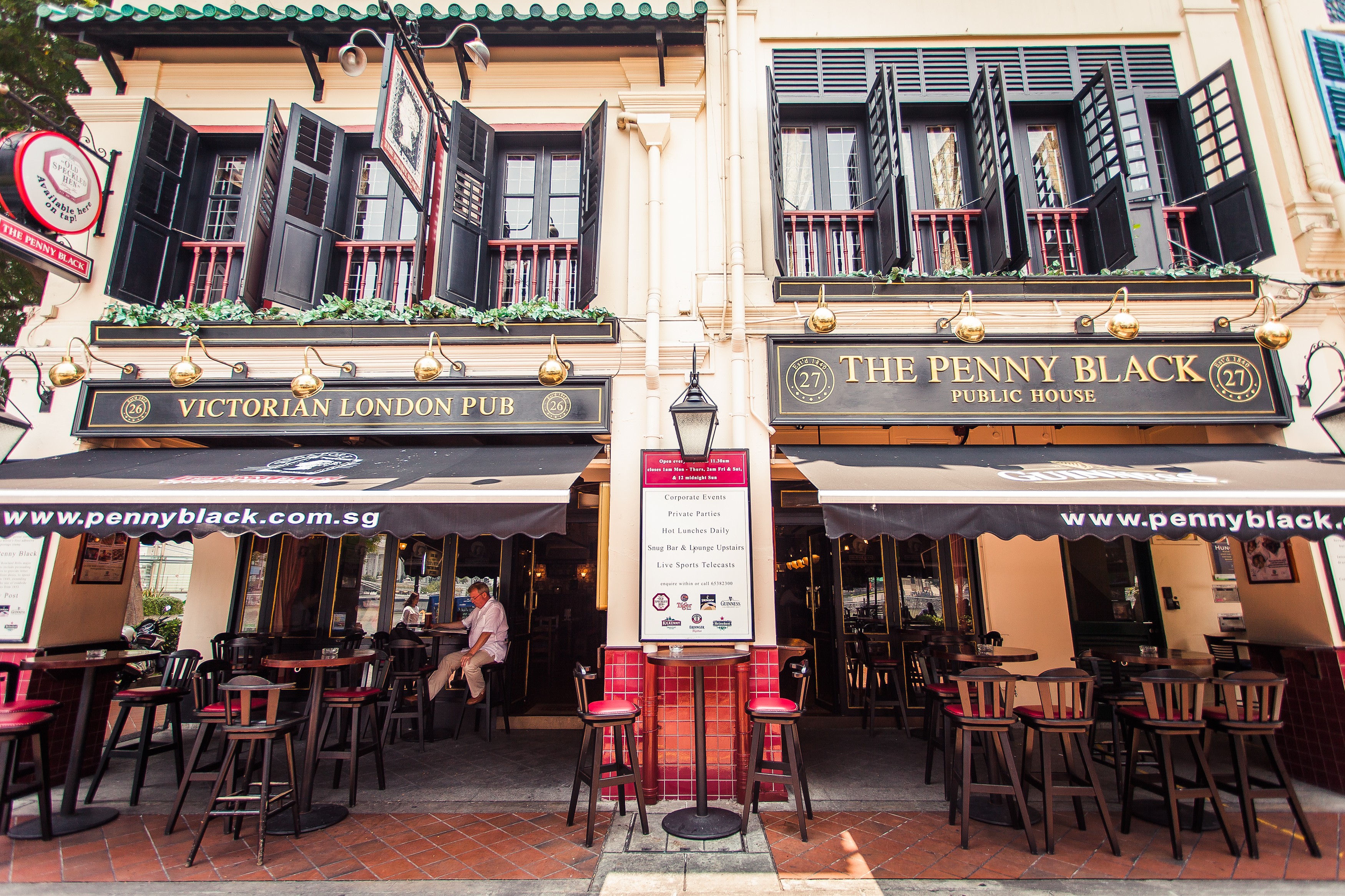 The Penny Black black-and-gold Victorian frontage at Boat Quay
